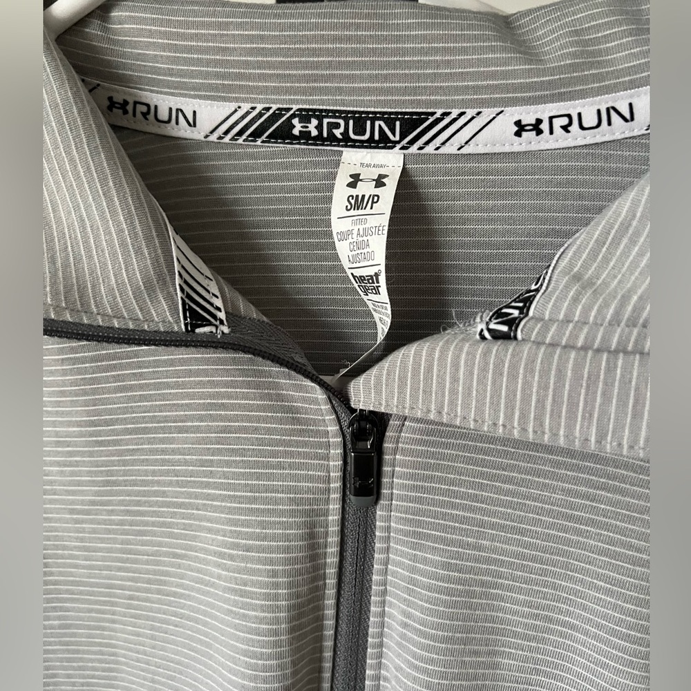 Under Armour half zip. Grey and white like new